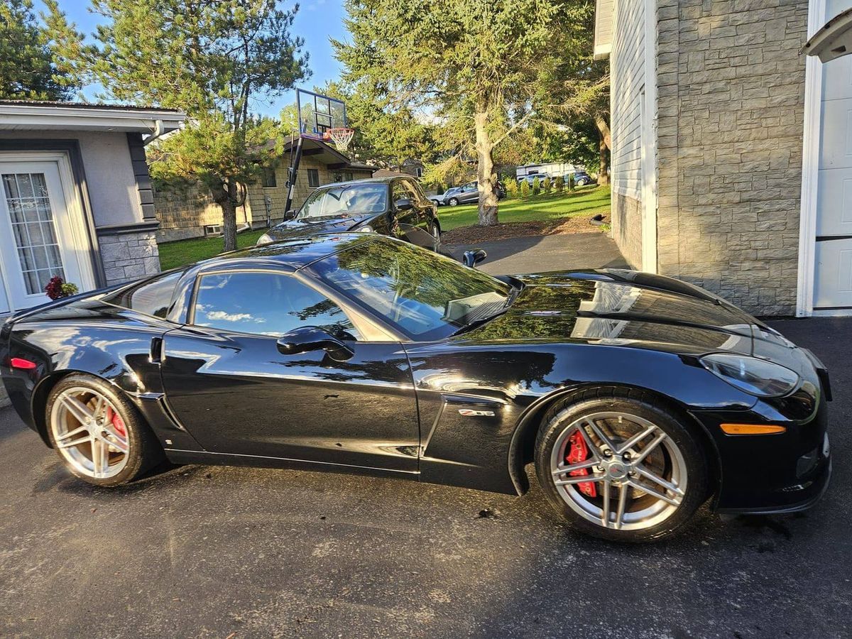 Black Chevrolet Corvette Z06 with a glossy exterior finish after detailing in the Greater Toronto Area